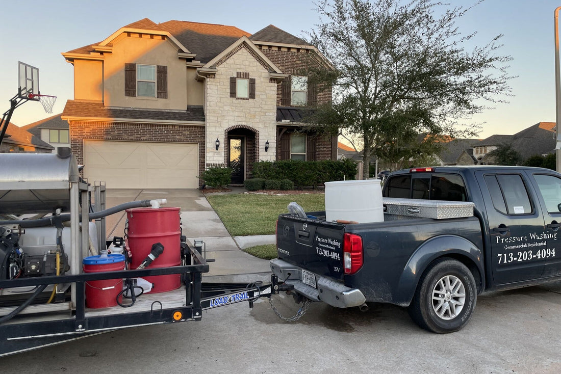 Soft washing a house in Galveston County